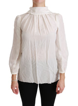 Elegante blusa de cuello de tortuga de seda blanca