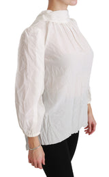 Elegante blusa de cuello de tortuga de seda blanca