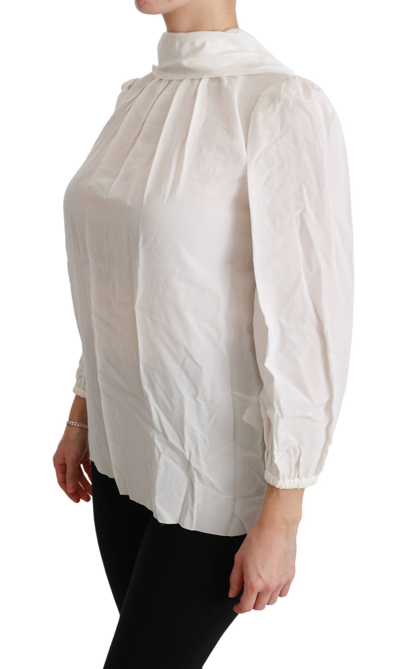 Elegante blusa de cuello de tortuga de seda blanca