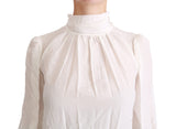 Elegante blusa de cuello de tortuga de seda blanca