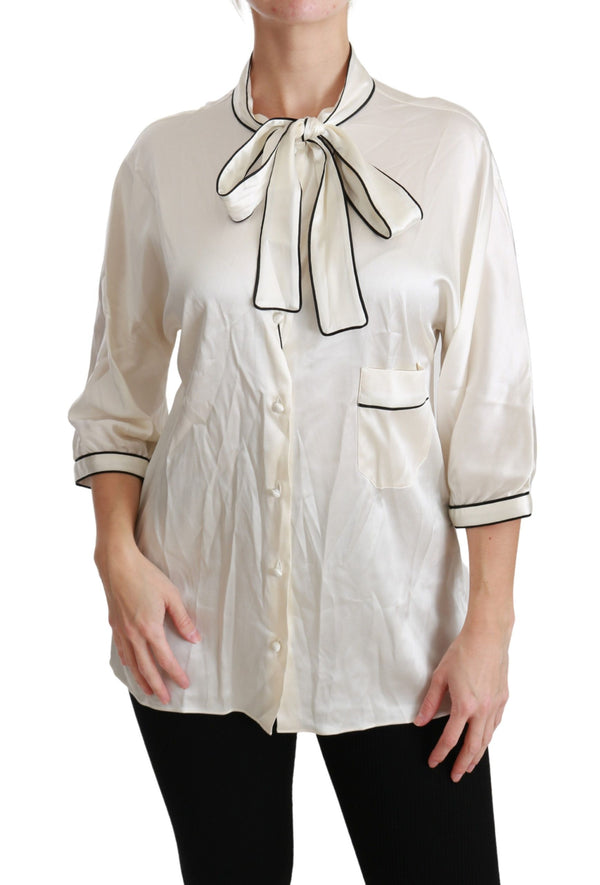 Blouse de soie beige élégante avec écharpe à arc