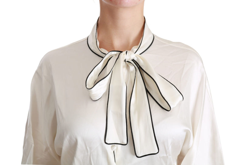 Blouse de soie beige élégante avec écharpe à arc