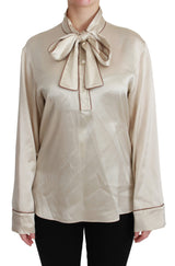 Blusa in raso di seta beige elegante con ricamo regina