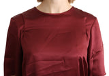 Elegante blusa de seda burdeos