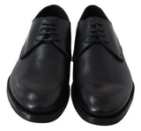 Elegantes zapatos de vestir derby de cuero negro