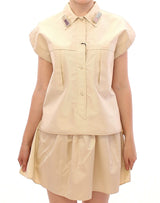 Elegante camiseta sin mangas de blusa beige