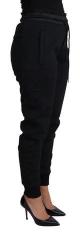 Eleganti pantaloni jogger neri con logo iconico