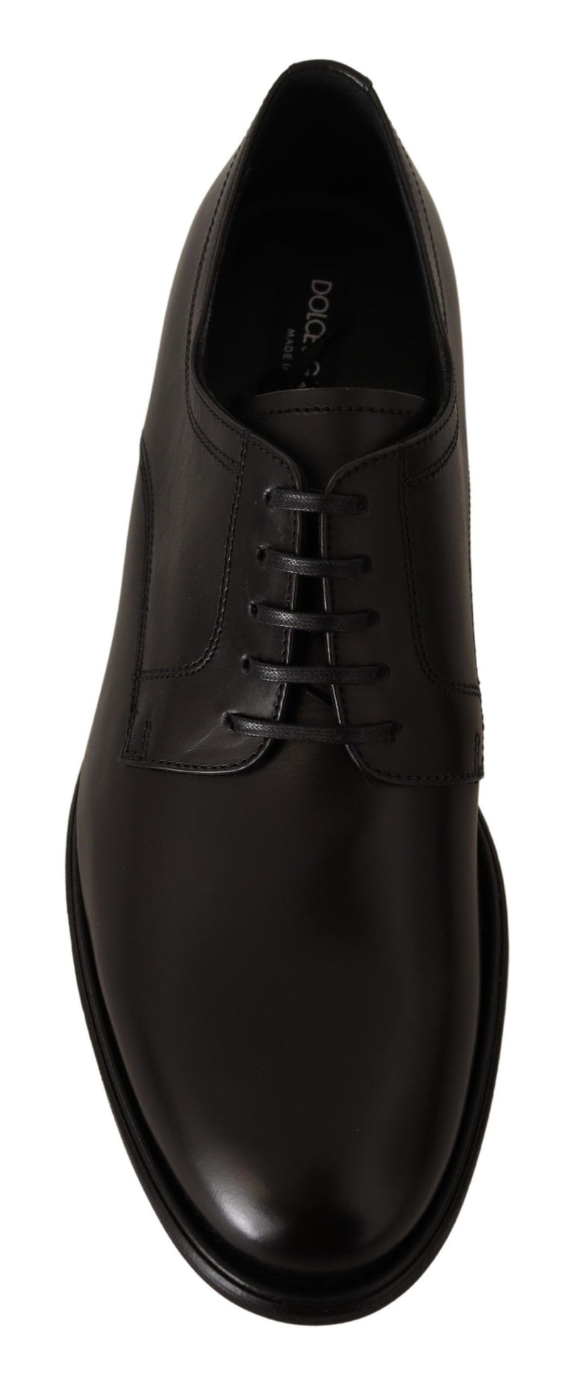 Elegantes zapatos de derby formales de cuero negro