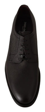 Elegantes zapatos de vestir derby de cuero negro