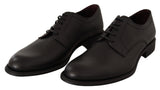 Elegantes zapatos de vestir derby de cuero negro