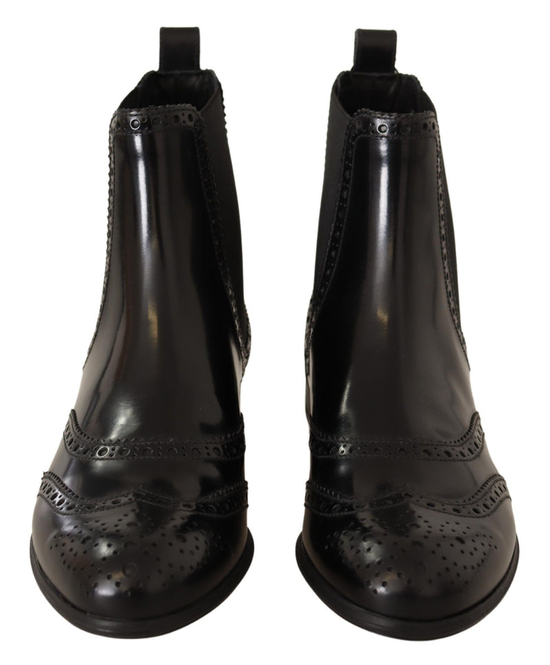 Elegantes botas de ala de tobillo negro oxford