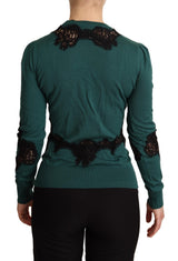 Elegante pullover verde con dettaglio in pizzo nero