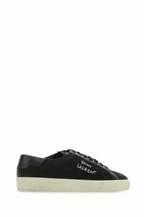 Sleek noire en toile et baskets basses en cuir