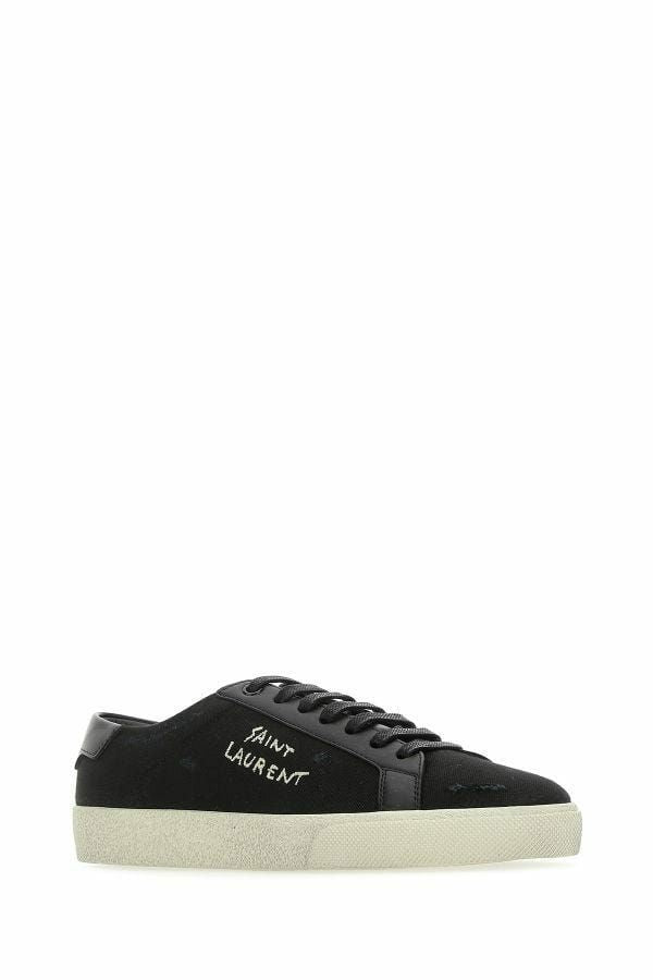 Sleek noire en toile et baskets basses en cuir