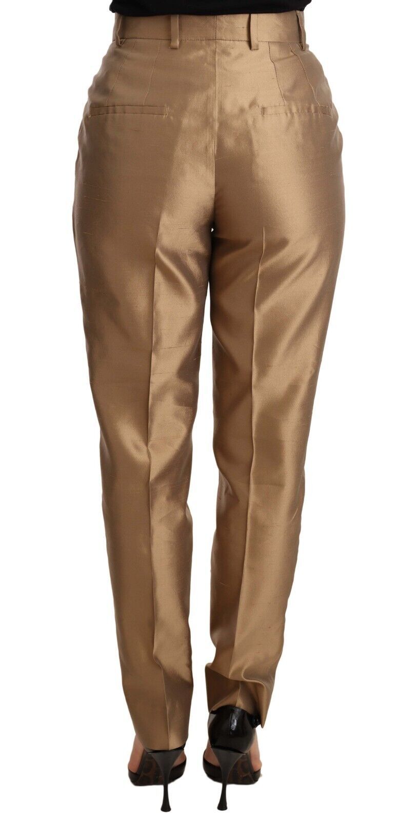 Elegantes pantalones de seda cónicos en oro