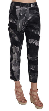 Elegantes pantalones de estampado de hojas de plátano negro Capri