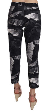 Elegantes pantalones de estampado de hojas de plátano negro Capri