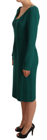 Robe de gaine midi vert émeraude avec broche cristalline