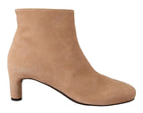 Elegantes botas de cuero beige