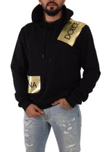 Erhöhen Sie Ihren Stil mit einem schwarzen Golden-Logo-Pullover