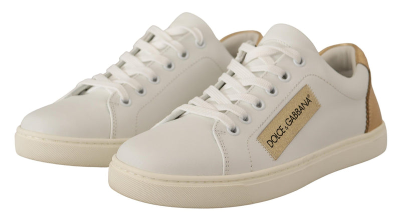 Eleganti sneaker in pelle bianca con accenti d'oro