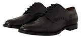 Elegantes zapatos formales de Wingtip Oxford