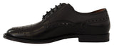 Elegantes zapatos formales de Wingtip Oxford