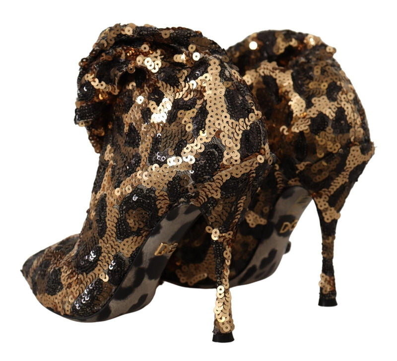 Elegantes botas de lentejuelas de leopardo hasta la rodilla