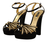 Elegantes sandalias de tacones de correa de tobillo de oro negro