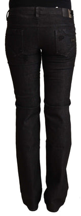 Jeans in denim nero magro a bassa vita chic