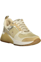 Elegante goldene Sport-Turnschuhe mit Schnürsenkel