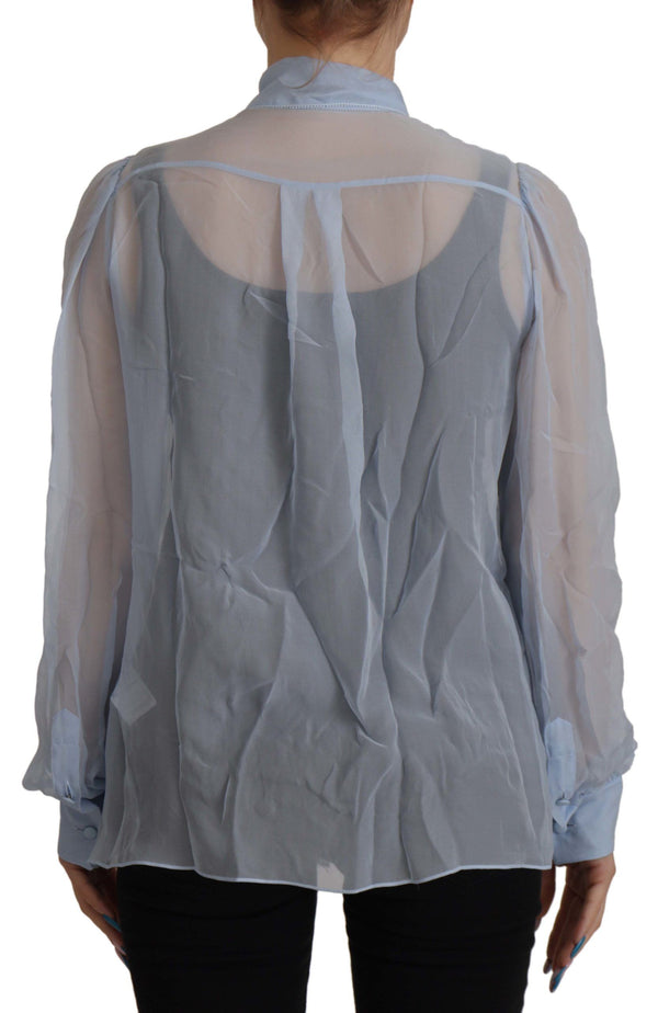 Elegante blusa de cuello ascot de seda en azul claro