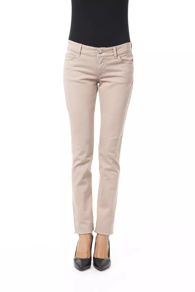 Eleganti pantaloni beige slim fit con dettagli a catena unici