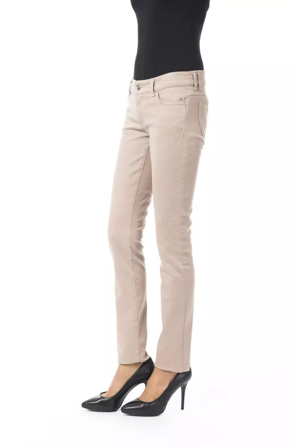 Élégant pantalon slim beige avec des détails de chaîne uniques