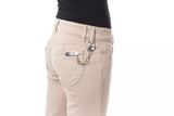 Élégant pantalon slim beige avec des détails de chaîne uniques