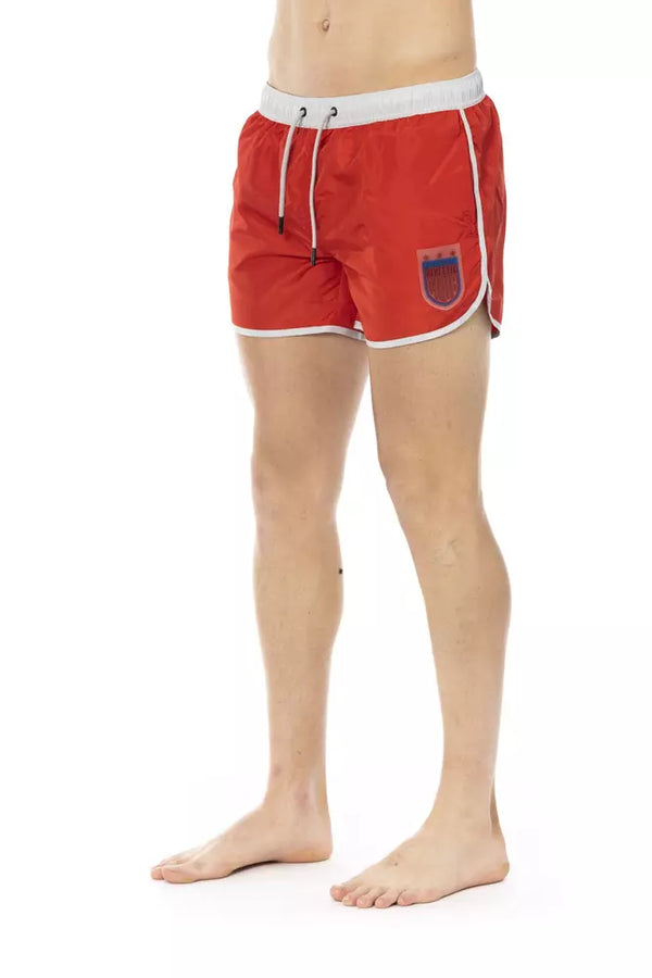 Pantalones cortos de natación rojos vibrantes con estampado frontal