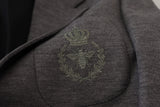 Elegante blazer de lana gris con bordado de corona de abejas