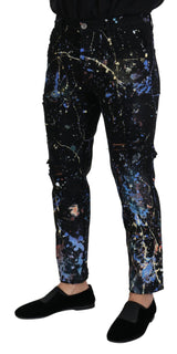 Squisiti pantaloni in denim con stampa a splash di colore