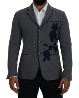 Blazer élégant en laine gris avec broderie de rose bleue