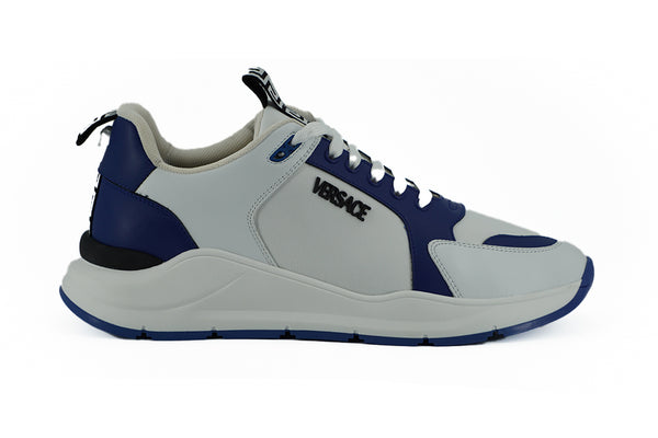 Elegantes zapatillas de cuero azul y blanco