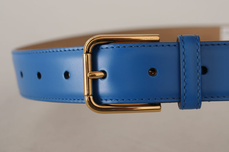 Elegante cintura in pelle blu con fibbia incisa