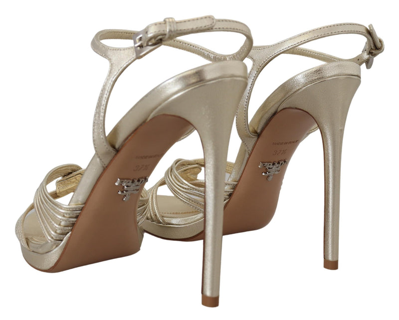 Elegante goldene Stiletto -Ferse Sandalen