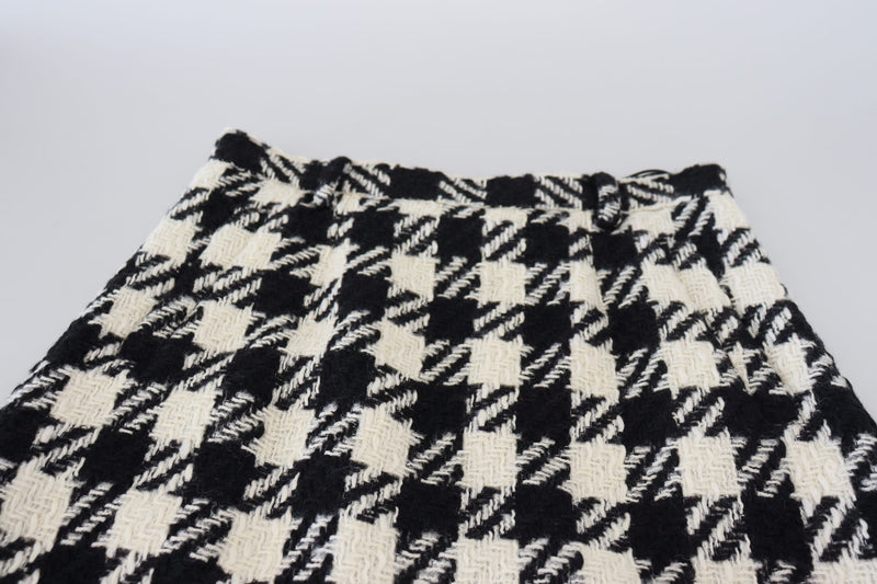 Eleganter Houndstooth mit hohem Knielängenrock mit hohem Taisten