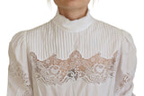 Elegante blusa de algodón de adorno de encaje blanco