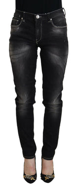 Elegantes jeans negros cónicos de cintura mid