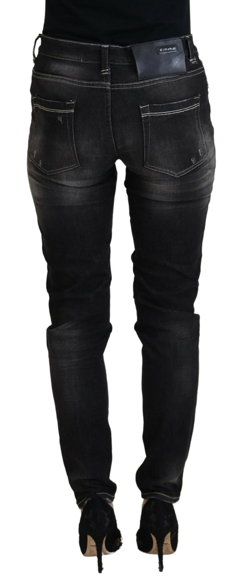 Elegantes jeans negros cónicos de cintura mid