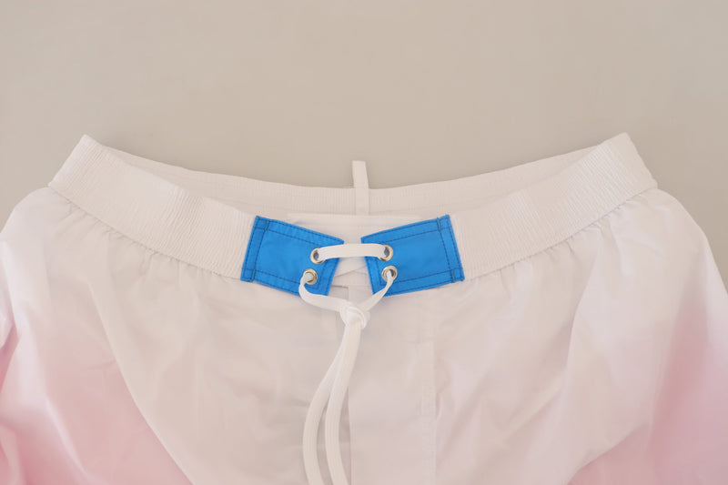 Pantalones cortos de natación con estampado blanco y rosa