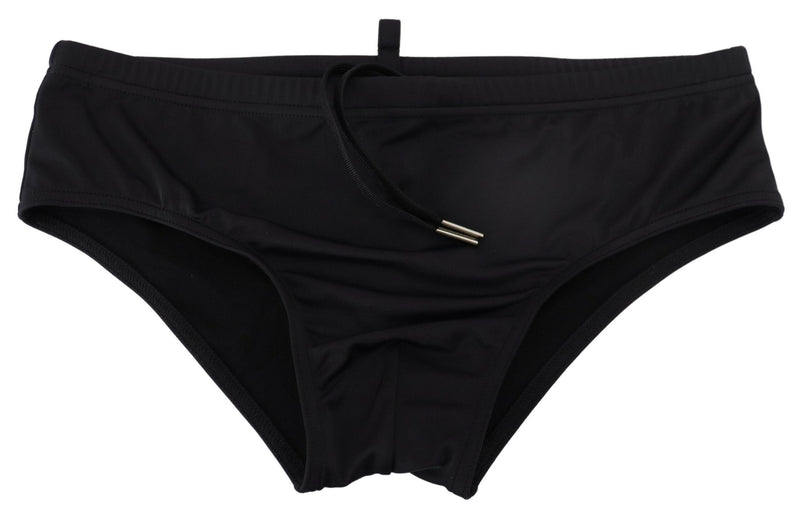 Eleganti brief di nuoto nero con logo arancione