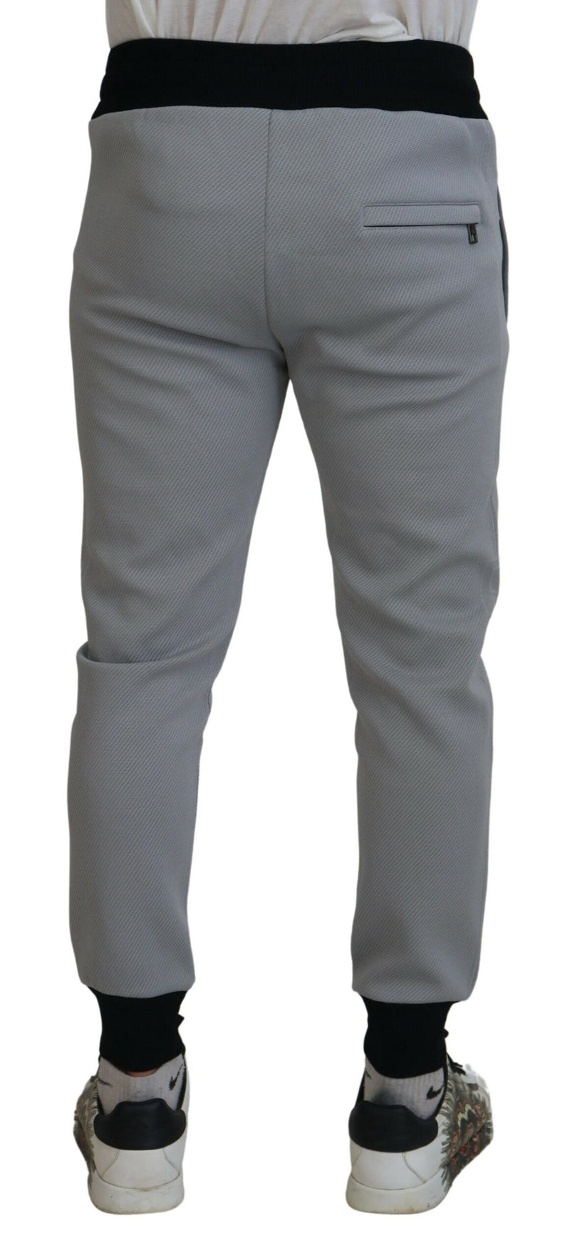 Elegantes pantalones de corredores grises