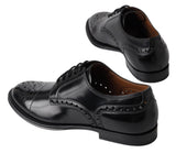 Elegante schwarze Leder Oxford Wingtip Schuhe